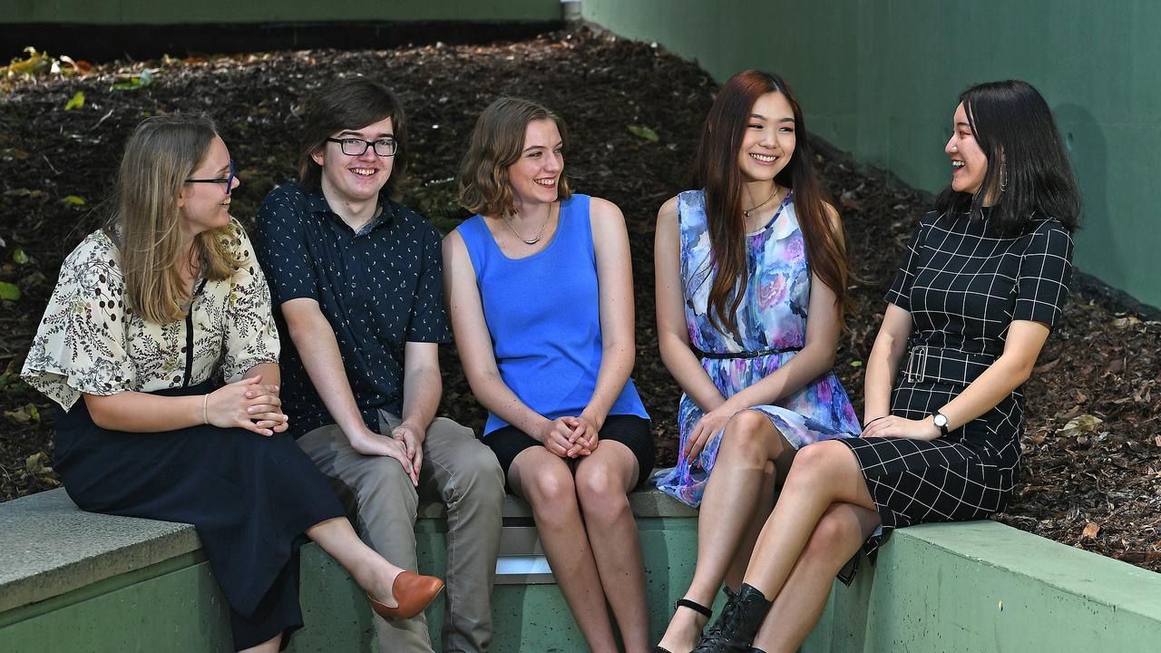 Grace Kennett, Jayden Webster, Maya Lamont, Serena Chen and Enle Yin pose for a photograph at the Student QCE Awards presentation at the State Library. Picture: AAP/John Gass