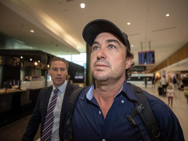 29/11/2022: Outback Wrangler Matt Wright walks to his flight at Sydney Airport. Picture: Liam Mendes / The Australian