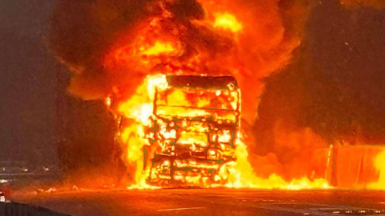 Baby among hurt as truck bursts into flames, Bruce Hwy cut