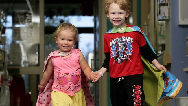 Cohen Dunne 4, and Zarlia Bosman, 2, show off their new superhero capes. Picture: Justin Sanson