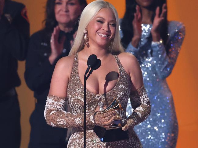 LOS ANGELES, CALIFORNIA - FEBRUARY 02: (FOR EDITORIAL USE ONLY) Beyonce accepts the Album of the Year for Ã¢â¬ÅCowboy CarterÃ¢â¬Â onstage during the 67th GRAMMY Awards at Crypto.com Arena on February 02, 2025 in Los Angeles, California. (Photo by Amy Sussman/Getty Images)