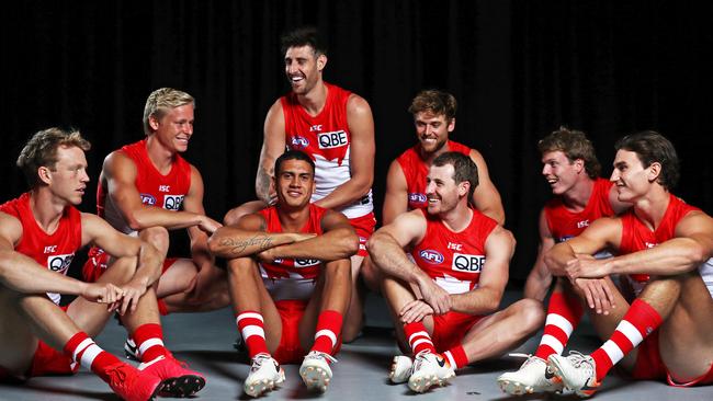 Sam Wicks, far right, loves being part of the Swans.