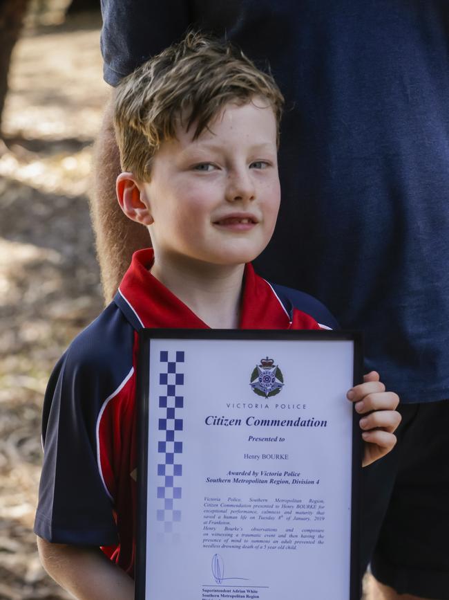 Henry, 7, with his award. Picture: Valeriu Campan