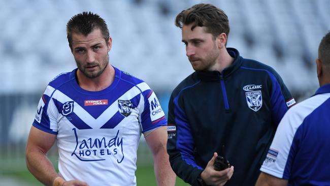 Kieran Foran comes off with a torn pec during the clash with Gold Coast on Saturday