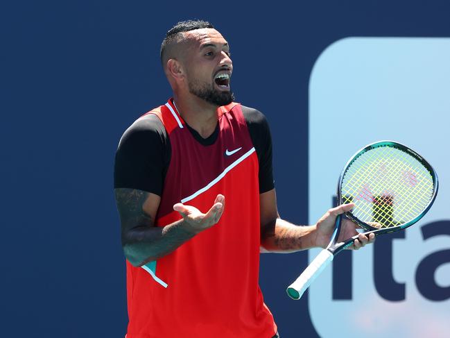 MIAMI GARDENS, FLORIDA – MARCH 29: Nick Kyrgios of Australia reacts after receiving a code violation from the referee in the tiebreak of the first set against Jannik Sinner of Italy during the Miami Open at Hard Rock Stadium on March 29, 2022 in Miami Gardens, Florida. Michael Reaves/Getty Images/AFP == FOR NEWSPAPERS, INTERNET, TELCOS &amp; TELEVISION USE ONLY ==