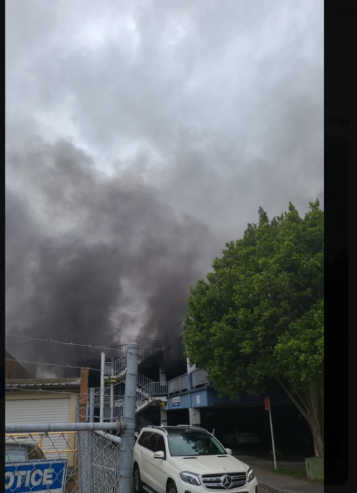 A multi level carpark is believed to have caught fire in Bankstown sending smoke billowing into the air. Source: Twitter