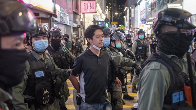 Ted Hui, a pro-democracy legislator, is arrested during a protest in the Causeway Bay district of Hong Kong, China, on Friday, June 12, 2020. Photographer: Justin Chin/Bloomberg via Getty Images