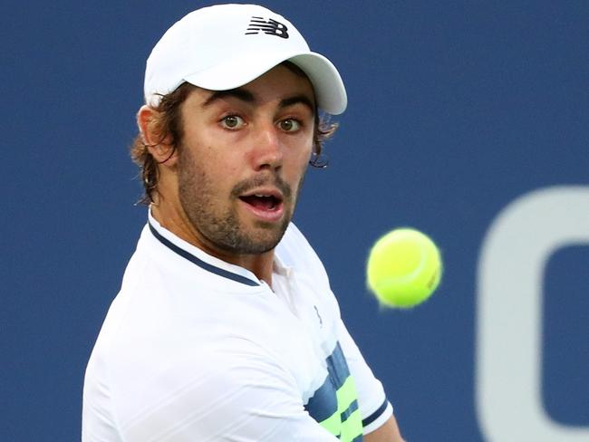 NEW YORK, NY - AUGUST 28: Jordan Thompson of Australia returns a shot during his first round Men's Singles match against Jack Sock of the United States on Day One of the 2017 US Open at the USTA Billie Jean King National Tennis Center on August 28, 2017 in the Flushing neighborhood of the Queens borough of New York City.   Al Bello/Getty Images/AFP == FOR NEWSPAPERS, INTERNET, TELCOS & TELEVISION USE ONLY ==