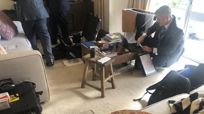 Australian Federal Police going through Annika Smethurst’s home in Canberra in June. Picture supplied