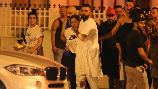 Devastated family at the scene where Maghnie was gunned down. Picture: Wayne Taylor