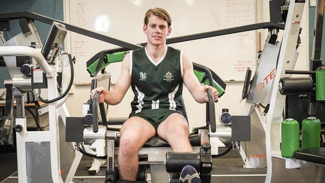 Glenelg’s Kaine Baldwin works out in the gym during his recovery from a knee reconstruction. Picture: Mike Burton