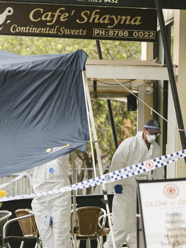 Forensics set up a crime scene. Picture: Tim Pascoe