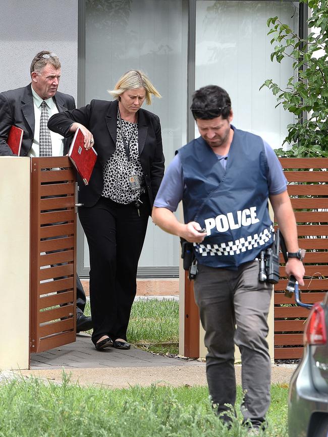 Detectives outside the house where the shots were fired in St Clair Ave, St Clair. Picture Roger Wyman