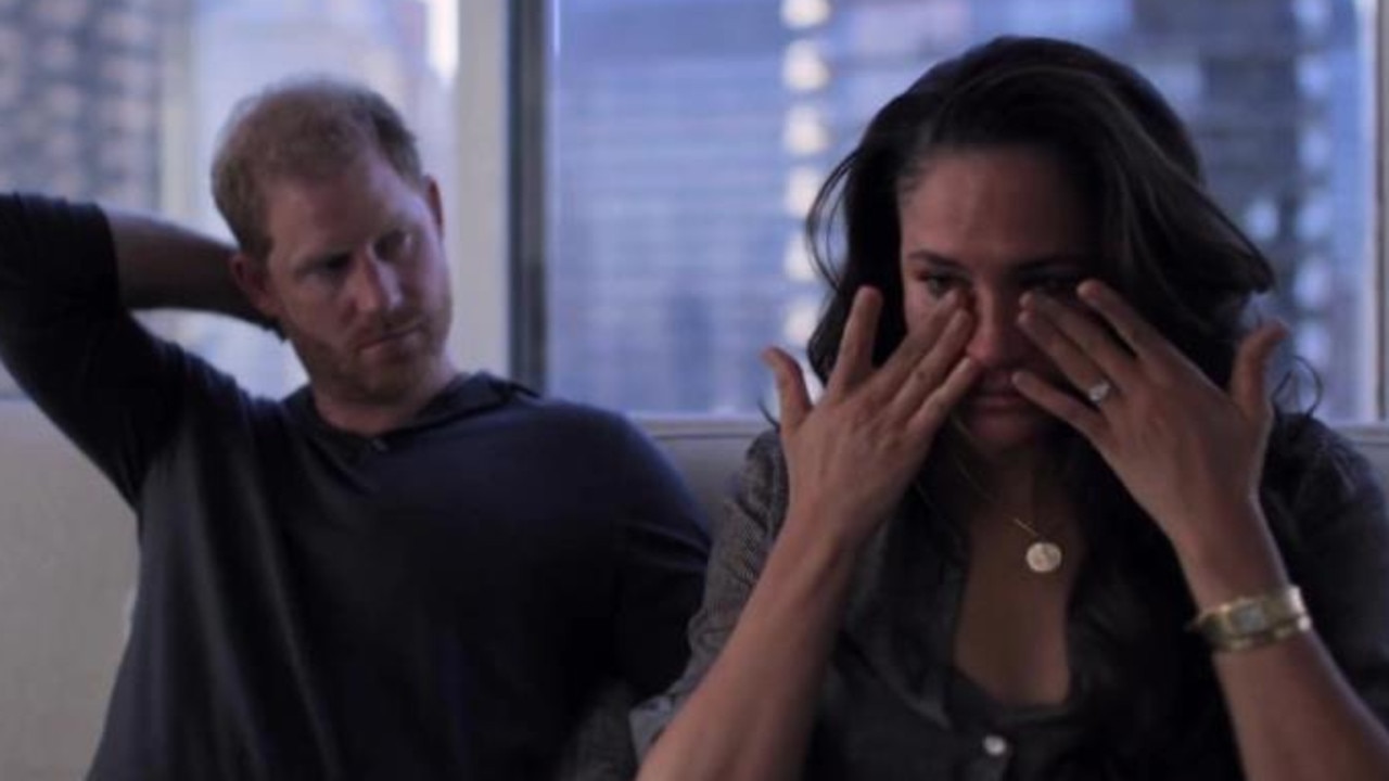 In the first trailer, Meghan is seen wiping her eyes as a concerned Prince Harry looks on. Picture: Netflix