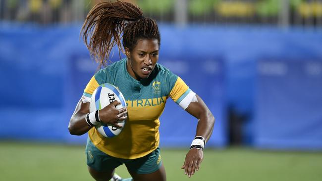 Australia's Ellia Green, and her braids, in full flight during the Olympics.