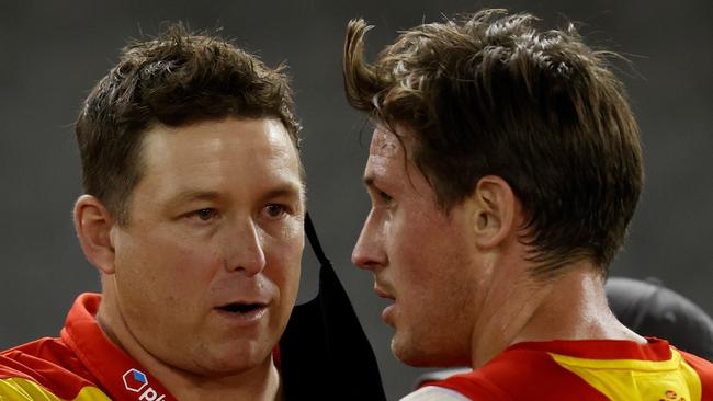 There are doubts over the future of Suns coach Stuart Dew (left). Picture: Michael Willson/AFL Photos via Getty Images