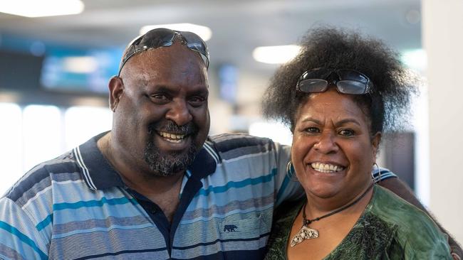 Darwin received its first arrivals from interstate as further border restrictions are lifted. Edward Tapim and Daphne Tapim from Townsville, QLD were excited to be back together after four months apart. Picture: Che Chorley