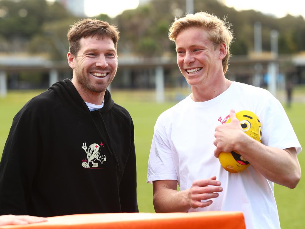 Greene and Heeney were all smiles as they ran drills at their 5th Quarter Camps. Picture: Brett Costello