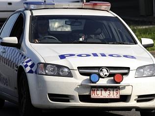  Police block Frankston Flinders Road in Somerville to investigate an alleged aggravated burglary. 