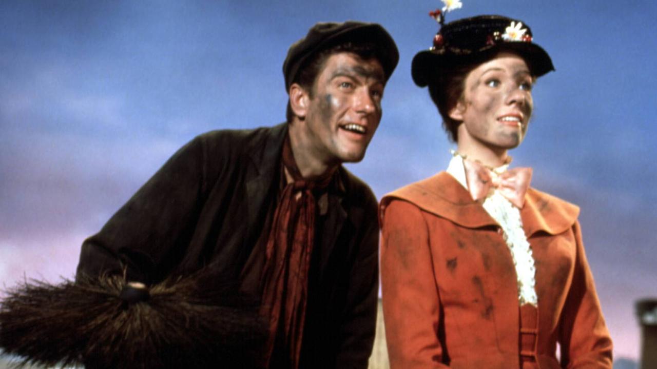 Actors Dick Van Dyke and Julie Andrews in a scene from Mary Poppins'.