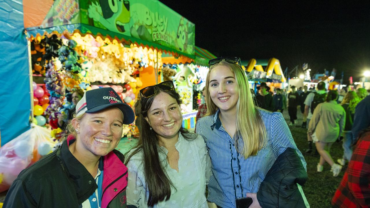 At sideshow alley are (from left) Eloise Gotz, Jo-Reese Donald and Shannon Bramwell at the 2022 Toowoomba Royal Show, Saturday, March 26, 2022. Picture: Kevin Farmer