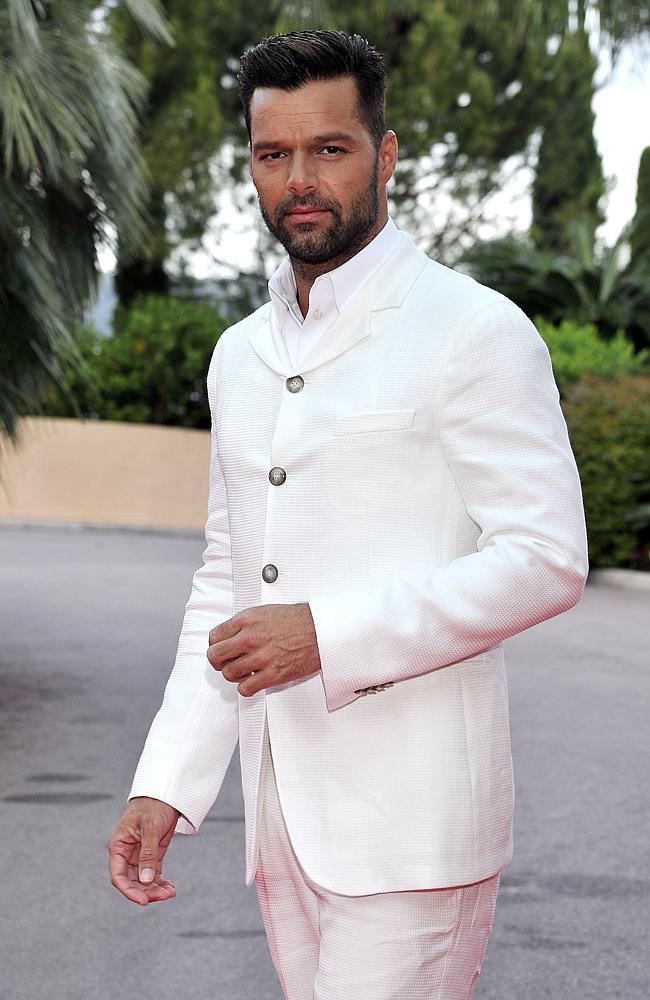 Smouldering ... Singer Ricky Martin poses as he arrives for the World Music Awards.