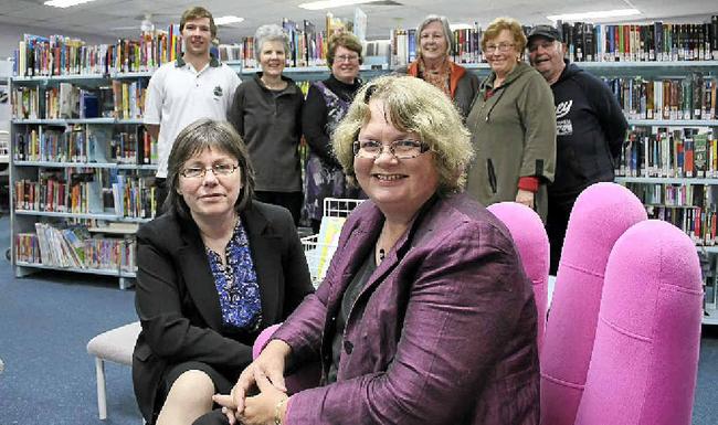 REPRIEVE: Sue McKerracher (front left) and Judy Brooker from the Australian Library and Information Association with supporters and staff Matthew Hanlon, Corena Wynd, Pam Crummy, Esabel Henry, Lesley Burgoyne and Peter Harris at the Goonellabah Library. Picture: Andy Parks