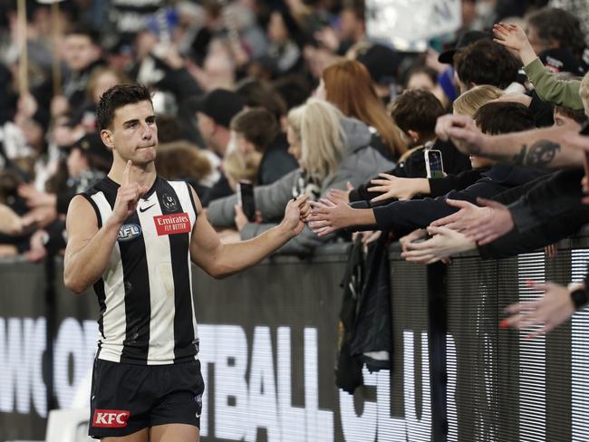 Nick Daicos enjoys a Magpies win with the club’s supporters.