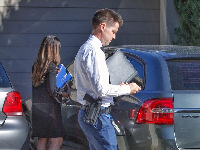 Police leave the Ristevski house in Avondale Heights. Picture: Mark Stewart