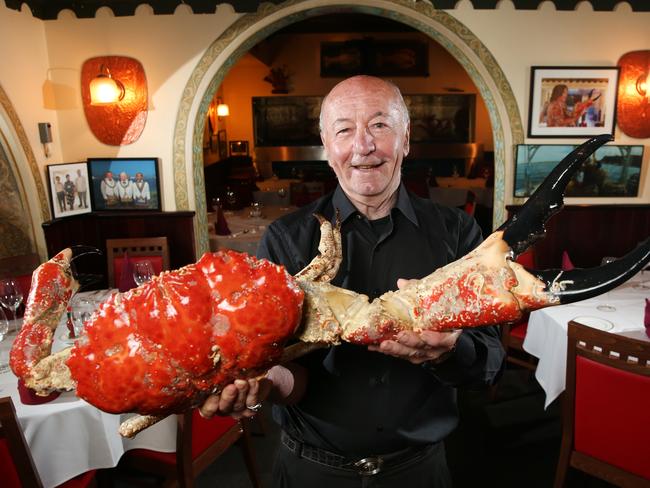 Owner of Blue Angel, Marcello Marcobello, with one of the restaurant’s signature king crabs. Picture: Richard Dobson