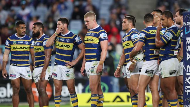 Eels players look on after a Warriors try. Picture: Brett Costello