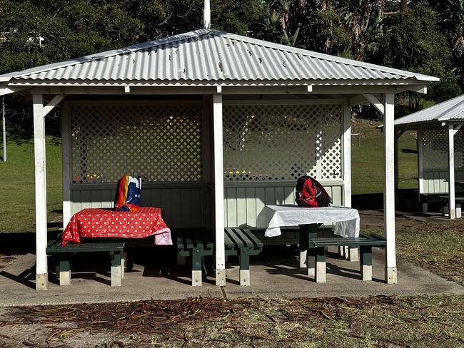 A photo of two “reserved” picnic tables at a popular beach in Sydney has gone viral with the snap causing a heated debate.