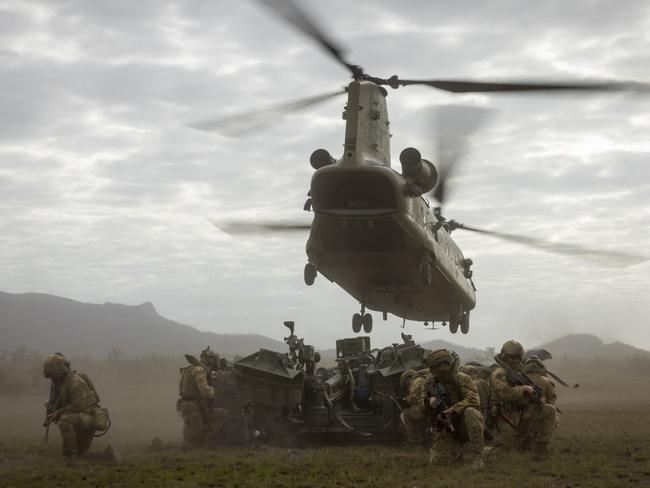 An Army CH-47 Chinook takes off after dropping off a M777 Howitzer from 4th Regiment, Royal Australian Artillery, during Exercise Talisman Sabre 2023 at Shoalwater Bay Training Area, Queensland. *** Local Caption *** Exercise Talisman Sabre 2023 is being conducted across northern Australia from 22 July to 4 August. More than 30,000 military personnel from 13 nations will directly participate in Talisman Sabre 2023, primarily in Queensland but also in Western Australia, the Northern Territory and New South Wales. Talisman Sabre is the largest Australia-US bilaterally planned, multilaterally conducted exercise and a key opportunity to work with likeminded partners from across the region and around the world. Fiji, France, Indonesia, Japan, Republic of Korea, New Zealand, Papua New Guinea, Tonga, the United Kingdom, Canada and Germany are all participating in Talisman Sabre 2023 with the Philippines, Singapore and Thailand attending as observers. Occurring every two years, Talisman Sabre reflects the closeness of our alliance and strength of our enduring military relationship with the United States and also our commitment to working with likeminded partners in the region. Now in its tenth iteration, Talisman Sabre provides an opportunity to exercise our combined capabilities to conduct high-end, multi-domain warfare, to build and affirm our military-to-military ties and interoperability, and strengthen our strategic partnerships.