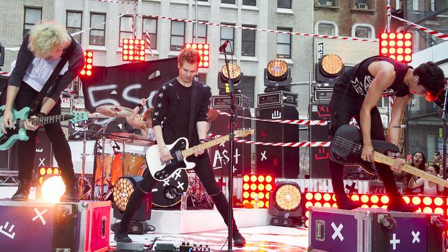 5 Seconds of Summer band members, from left, Michael Clifford, Ashton Irwin, Luke Hemmings and Calum Hood perform on NBC's "Today" show on Tuesday in New York. (Photo by Charles Sykes/Invision/AP)