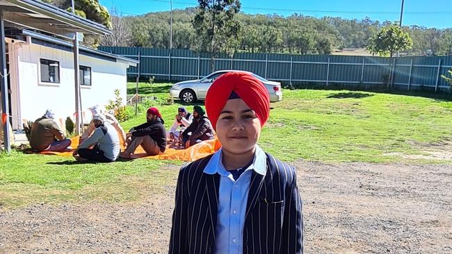 GIVING FROM THE HEART: Meet young Onkarveer Singh Khalsa, who spent his 10th birthday donating hotdogs and soft drink to the less fortunate members of the Toowoomba community at Tony's Kitchen. Onkarveer says the Sikh faith places special emphasis on helping those who are hungry and struggling so that’s just what he decided to do. Pictures: Contributed