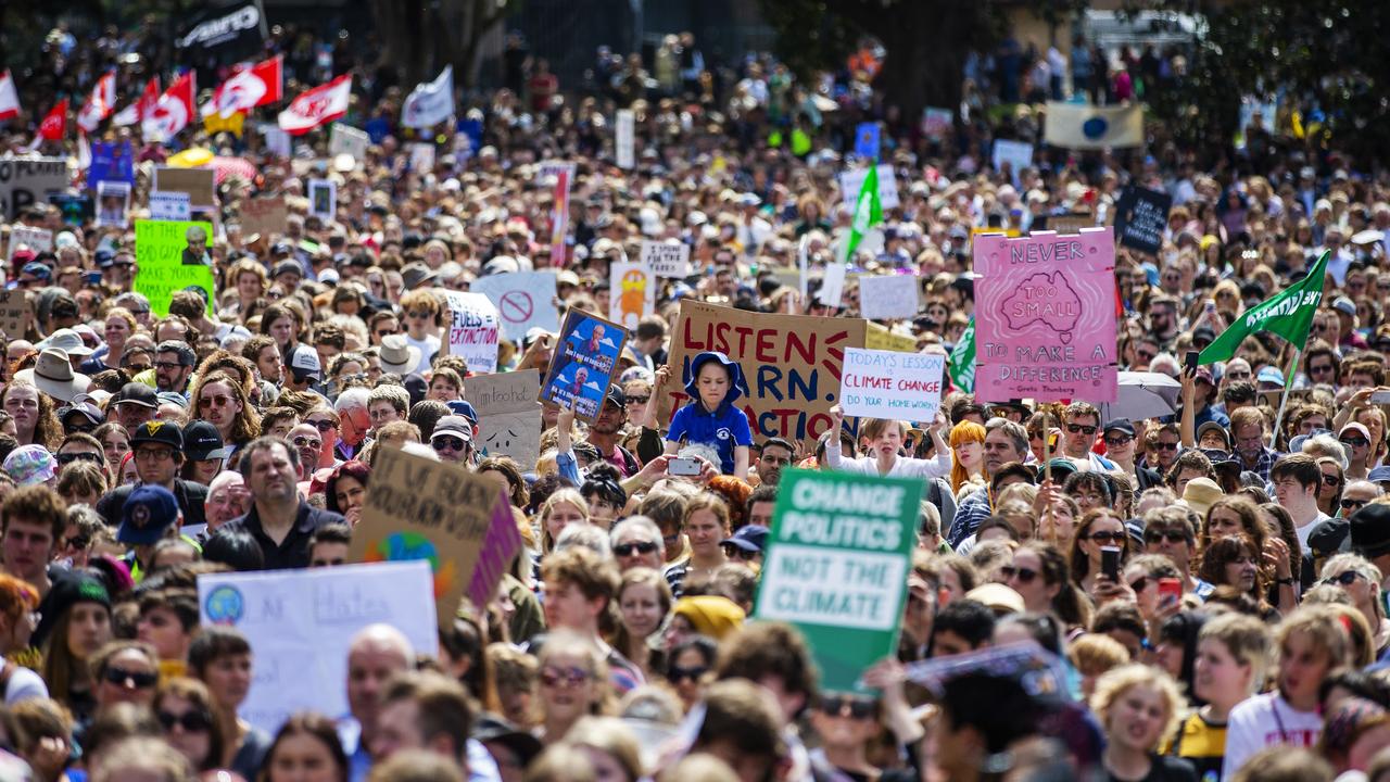 Thousands of school students and protesters gather in The Domain ahead of a climate strike rally on September 20.