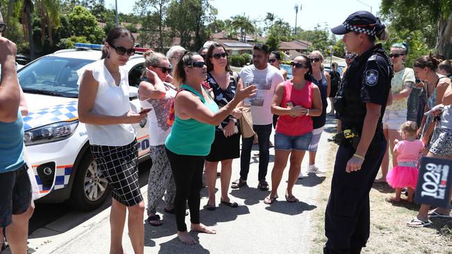 Scenes outside Helensvale Primary School after it went into lockdown. Photograph : Jason O'Brien