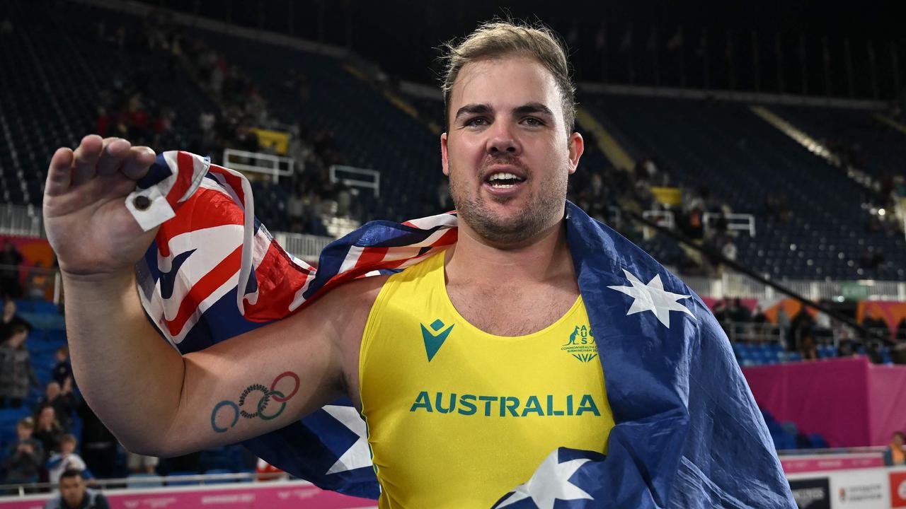 Australia's Matthew Denny celebrates after winning the men's discus