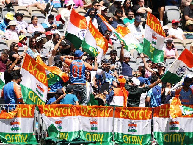 PERTH, AUSTRALIA - NOVEMBER 23: Indian fans show their support during day two of the First Test match in the series between Australia and India at Perth Stadium on November 23, 2024 in Perth, Australia. (Photo by Robert Cianflone/Getty Images)