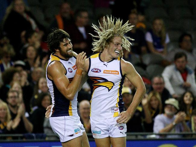 Tom Lamb celebrates his first goal in the AFL with West Coast Eagles teammate Josh Kennedy in 2015. Picture: Colleen Petch.