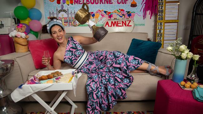 Milliner Angela Menz in her Abbotsford apartment decked out for the Melbourne Cup Day. Picture: Tony Gough