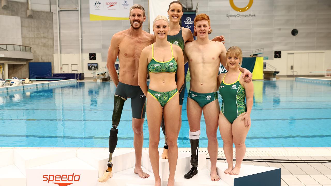 Members of the Australian Paralympic swim team Ellie Cole, Brenden Hall, Tiffany Thomas Kane, Keira Stephens and Col Pearse pose during the Australian 2020 Tokyo Olympic Games Swimming Uniform Launch on May 13, 2021 in Sydney. Picture: Cameron Spencer/Getty Images.