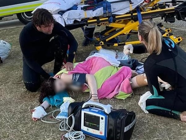 Lifeguards and surfers rescued two teens from waters at Ocean Grove beach after a shark attack. Picture: Facebook