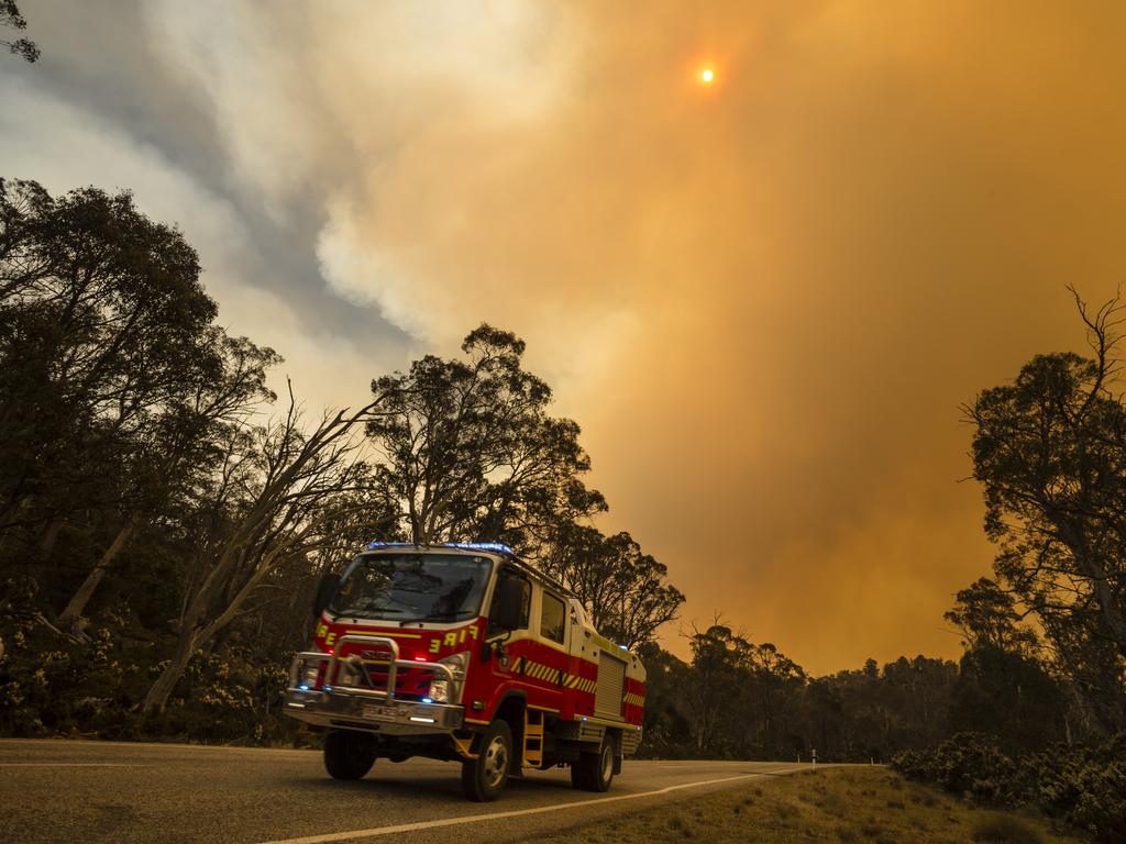 Smoke fills the sky near Miena as the Tasmania Fire Service issued an emergency warning for the town. Picture: Heath Holden/Getty