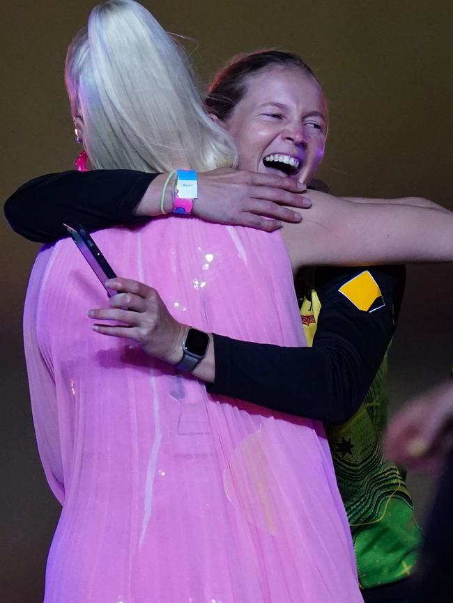 Katy Perry hugs Aussie captain Meg Lanning. Picture: AAP Image/Scott