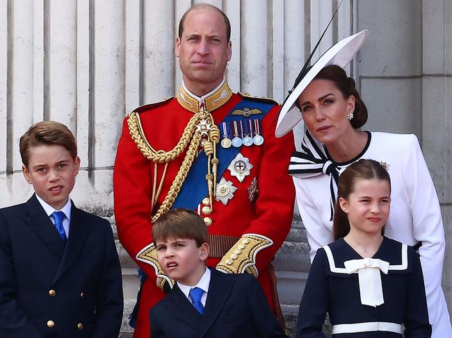 The Wales’ took in the fly-past from the balcony. Picture: Henry Nicholls/AFP