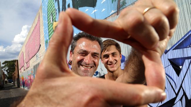 Eddie Tamir and son Benji outside the theatre site in 2017. Picture: Hamish Blair