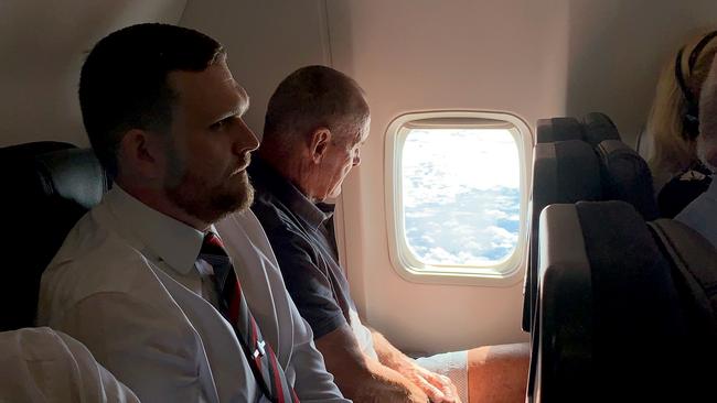 06/12/2018: 70 year old Chris Dawson is escorted by NSW Police whilst being flown from Queensland to NSW to face charges of murder over the death of his wife Lyn Dawson. PIC: Lyndon Mechielsen/ The Australian