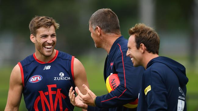 Jack Viney of the Demons speaks to Mark Visser and Trevor Hendy during a Melbourne training session at Gosch's Paddock. Picture: Quinn Rooney/Getty Images