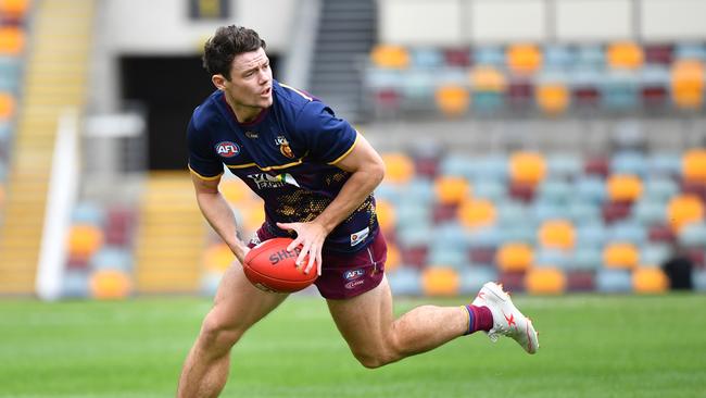 Lachie Neale of the Lions is seen warming up before the Round 2 AFL match between the Brisbane Lions and the Fremantle Dockers at The Gabba in Brisbane, Saturday, June 13, 2020. (AAP Image/Darren England) NO ARCHIVING, EDITORIAL USE ONLY